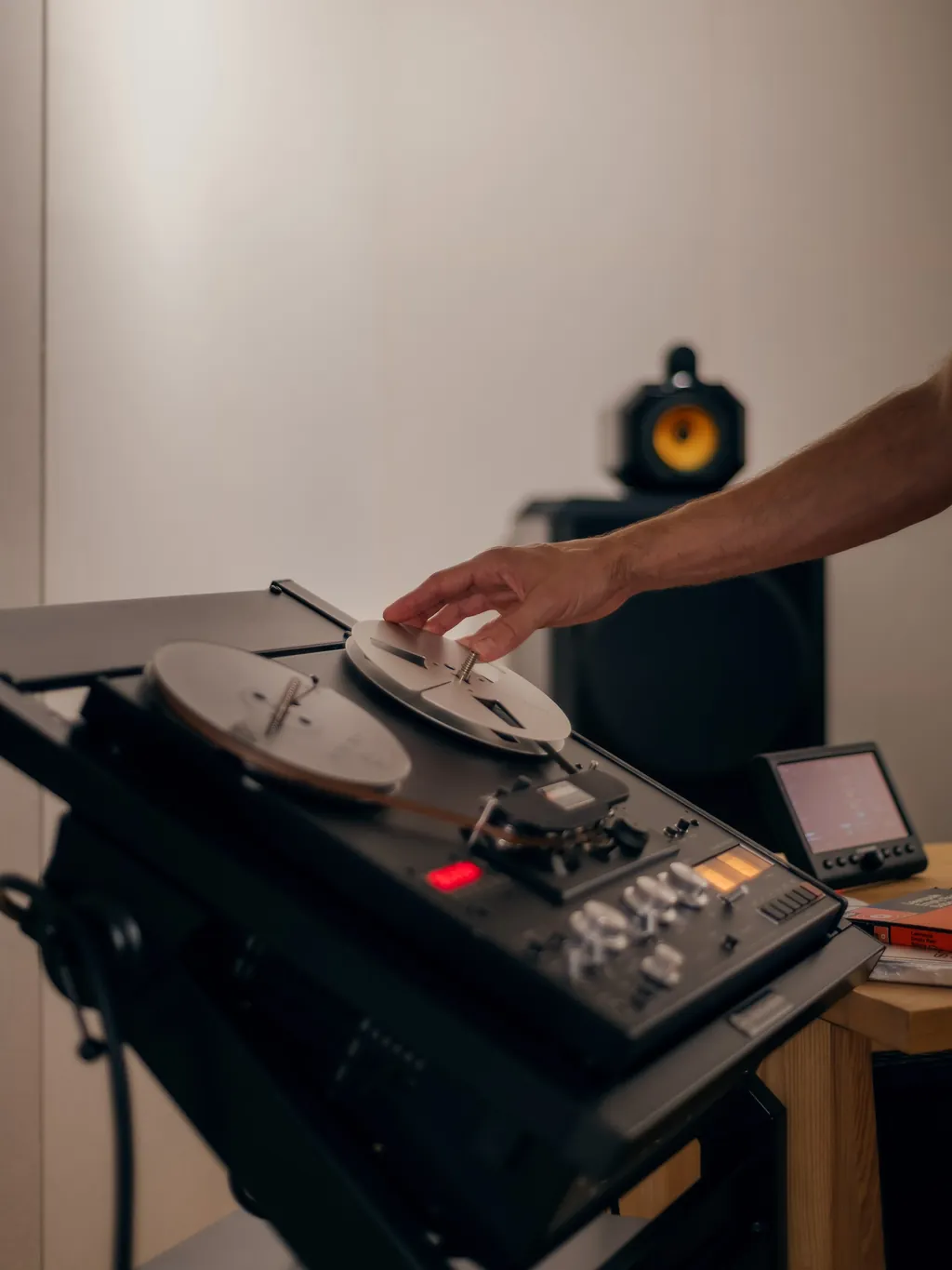 Loading a 1/4-inch reel on a tape machine for digitization